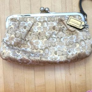Coach gold and silver wristlet